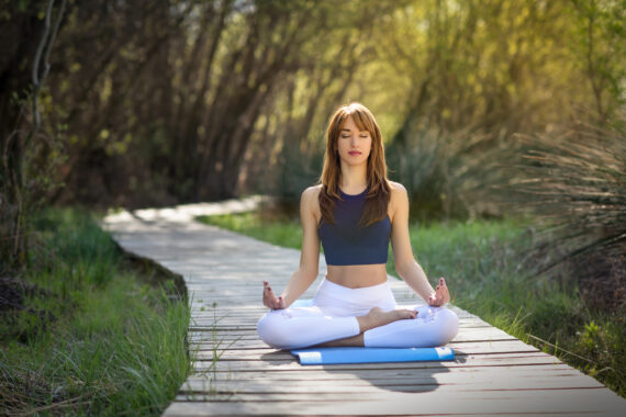 woman doing yoga in nature